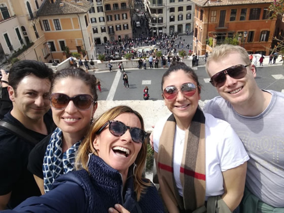 a group of people posing for the camera